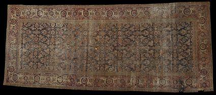 Appraisal: PERSIAN CORRIDOR CARPET Cobalt field overlayed with floral trellis work