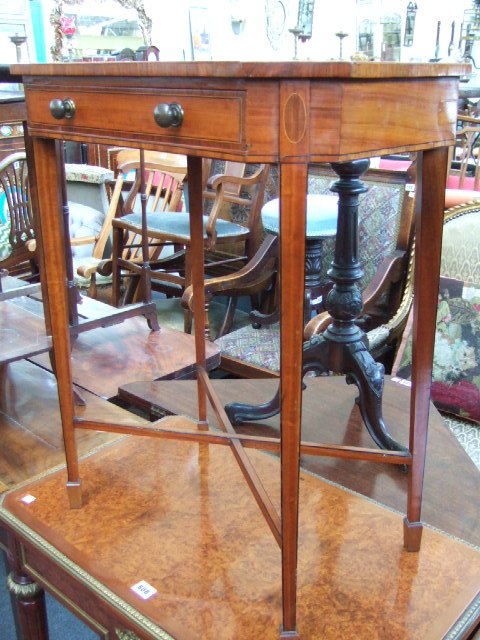 Appraisal: A George III mahogany and tulipwood cross banded side table