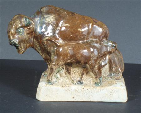 Appraisal: A Stella Crofts pottery figure of a bison family group