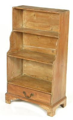 Appraisal: A th century pine waterfall bookcase with a base drawer