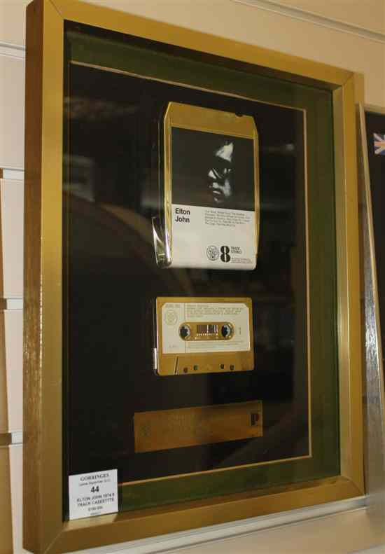 Appraisal: Elton John A gold Eight Track and Cassette Award presented