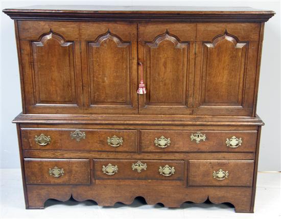 Appraisal: George III oak cupboard on chest converted from a mule