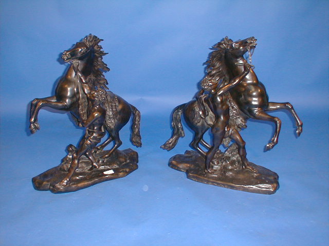 Appraisal: A fine pair of brown patinated bronze Marley horses with