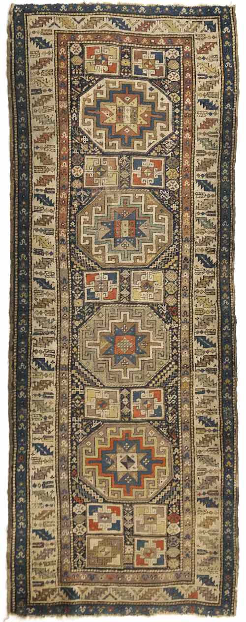 Appraisal: Caucasian runner with four large medallions on a blue field