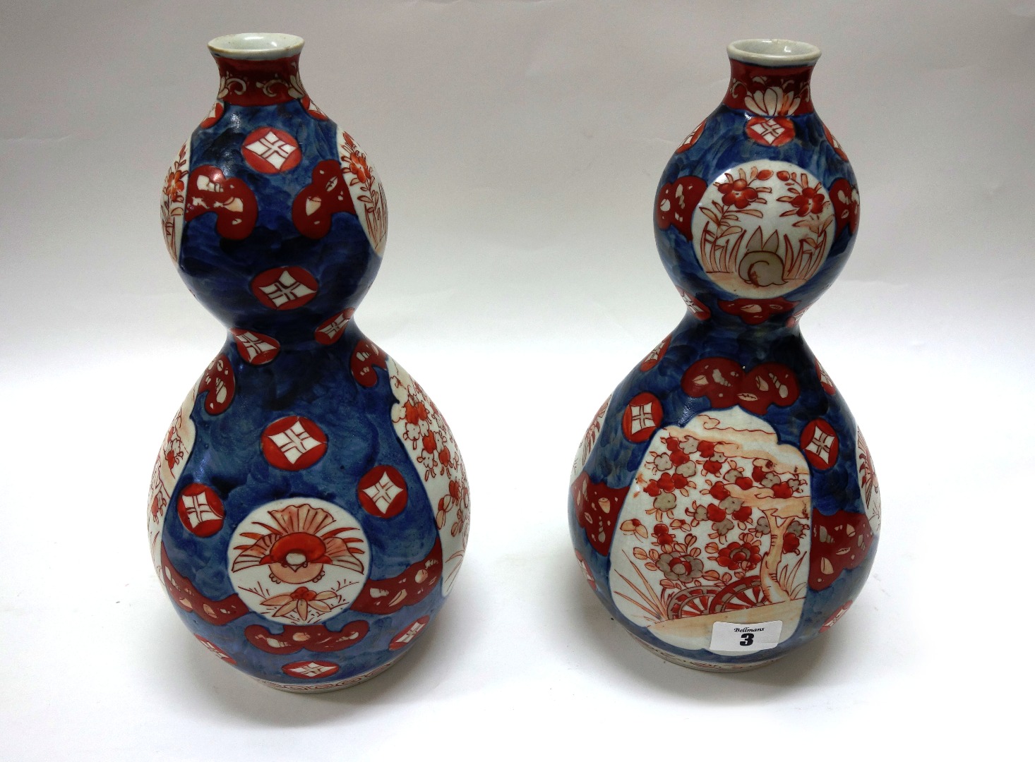 Appraisal: A pair of Japanese Imari double gourd vases Meiji cm