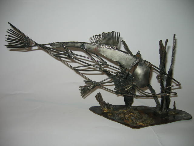 Appraisal: WELDED STEEL SCULPTURE in the form of a fish monogrammed