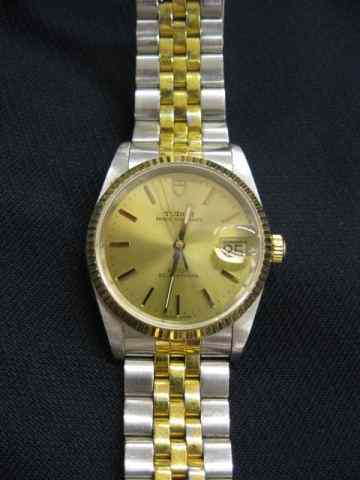 Appraisal: Tudor Man's Gold Stainless Wristwatch by Rolex champagne dial Prince