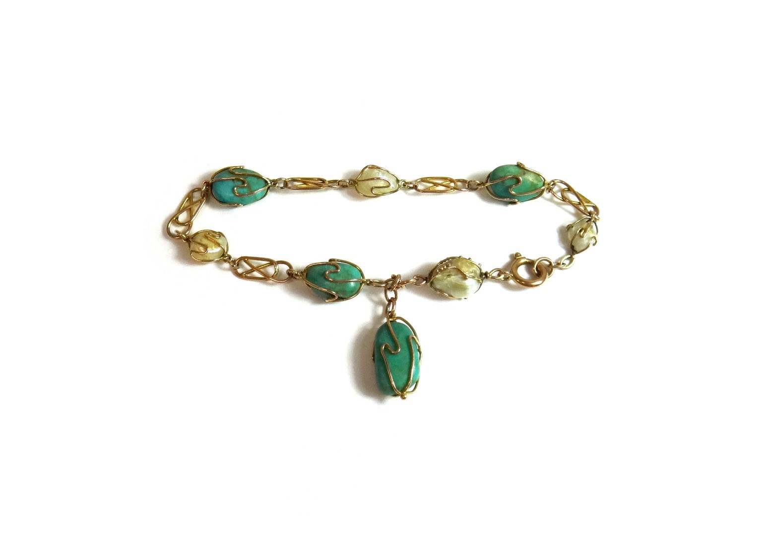 Appraisal: A gold turquoise and freshwater cultured pearl bracelet in a