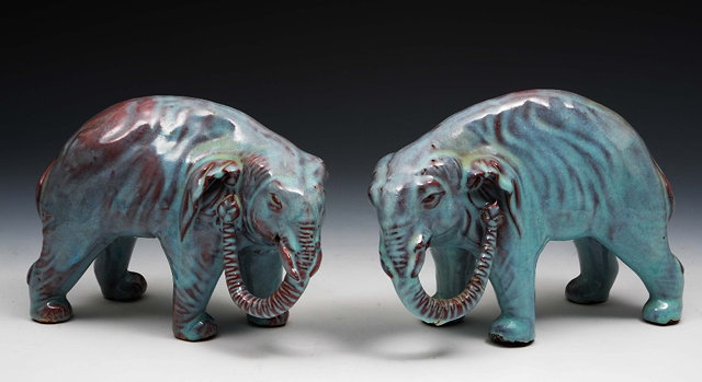 Appraisal: A pair of Chinese glazed Shiwan South China elephants th