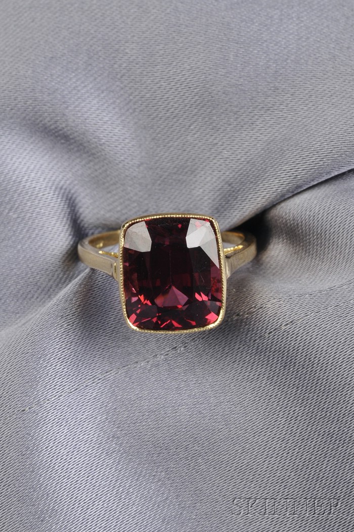 Appraisal: kt Gold and Spinel Ring bezel-set with a cushion-shaped spinel