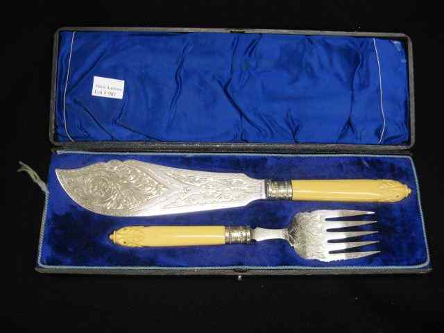 Appraisal: English Silverplate Fish Serving Set carvedivory handles circa '' long