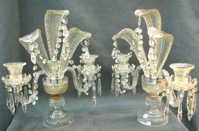 Appraisal: Pair of two-branch crystal candelabra in three-feather epergne motif