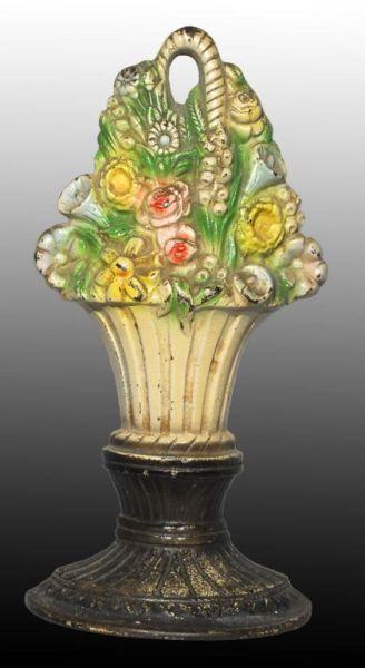 Appraisal: Cast Iron Mixed Flowers in Basket Doorstop Description Made by