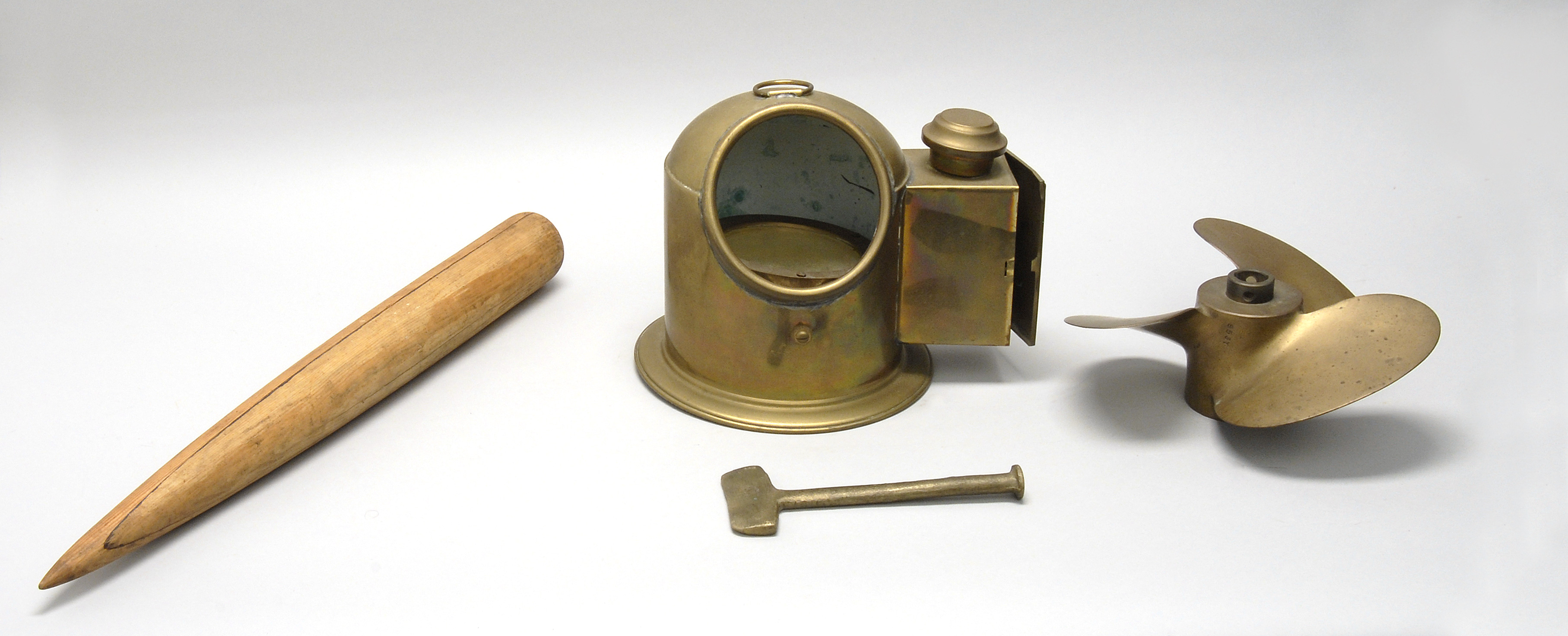 Appraisal: FOUR MARITIME-RELATED ITEMS A yacht binnacle a caulking tool a