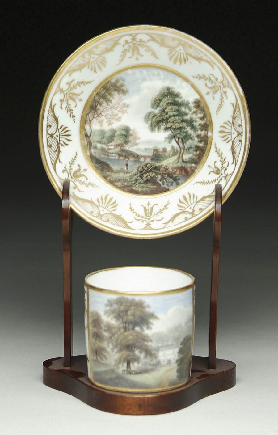 Appraisal: CONTINENTAL PORCELAIN CUP AND SAUCER Saucer having an under glaze