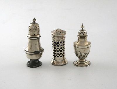 Appraisal: A Victorian silver pepper pot fluted urn form by E