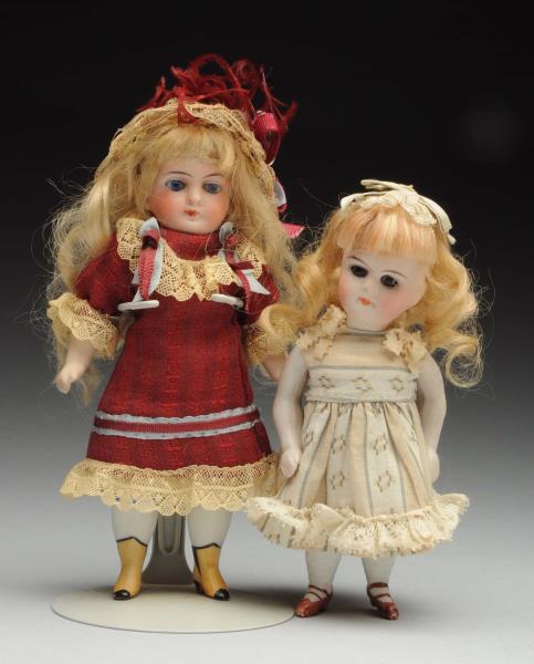 Appraisal: Lot Of German All-Bisque Dolls One possibly by ABG with