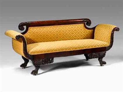 Appraisal: Classical carved mahogany sofa philadelphia circa The rounded rail with