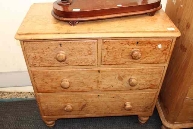 Appraisal: A SMALL PINE CHEST of two short and two long