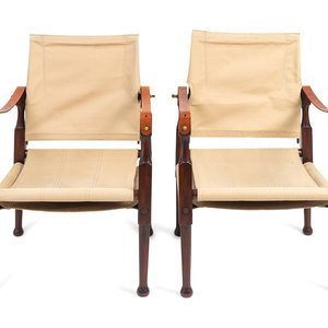 Appraisal: A Pair of British Colonial Style Mahogany Canvas and Leather