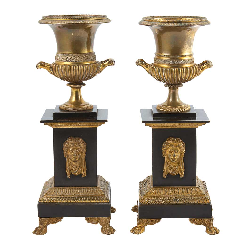 Appraisal: Pair of Empire Style Gilt and Patinated-Bronze Urns th Century