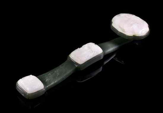 Appraisal: A Spinach Jade and White Jade Inset Ruyi Scepter having