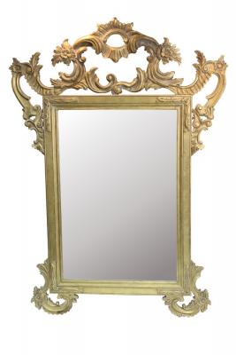 Appraisal: A gilt framed overmantel mirror with pierced scrolling crest the