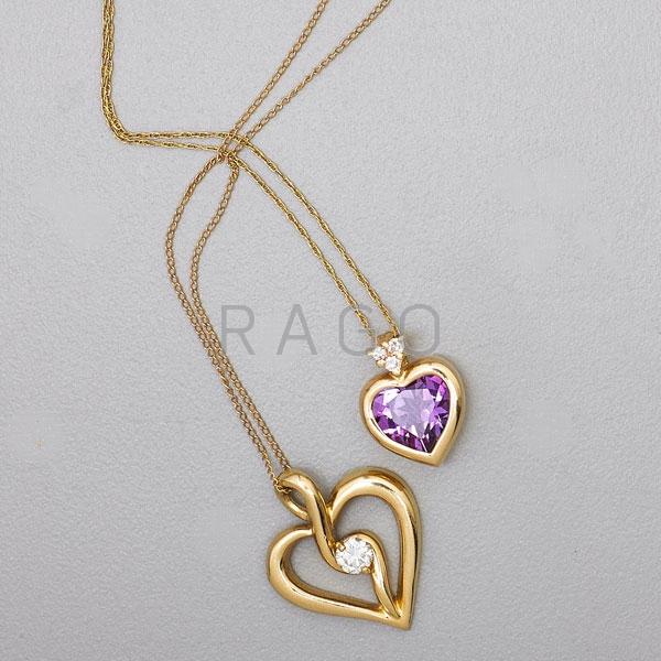 Appraisal: TWO K YELLOW GOLD HEART PENDANTS WITH DIAMONDS Condition Report