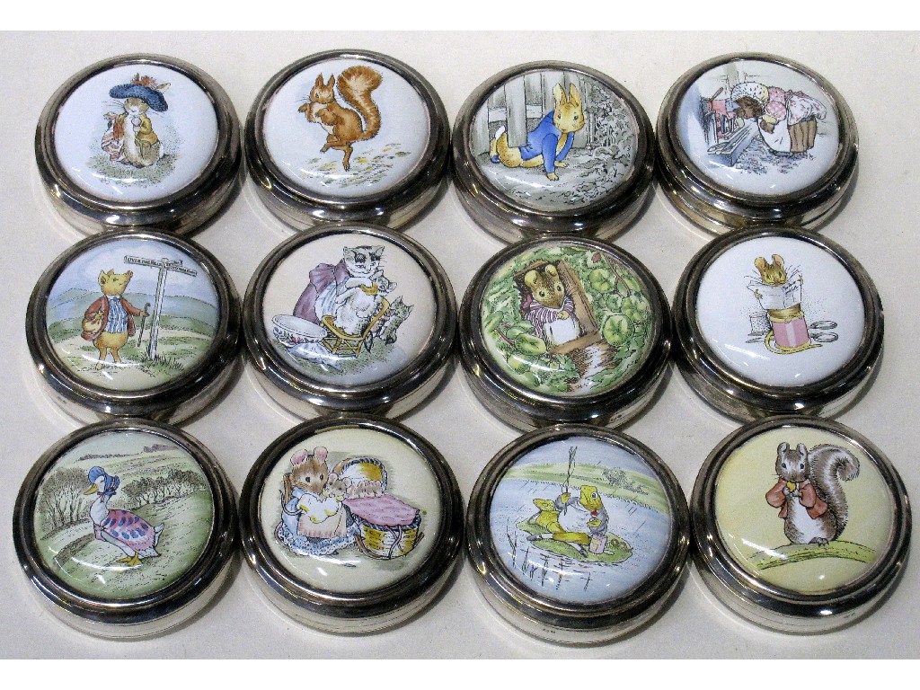 Appraisal: Set of twelve modern silver boxes decorated with Beatrix Potter