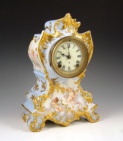 Appraisal: ANSONIA CHERUB PORCELAIN CASE CLOCK Hand painted porcelain case with