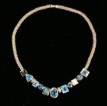 Appraisal: Michael Dawkins Diamond and Assorted Blue Topaz Necklace A signed