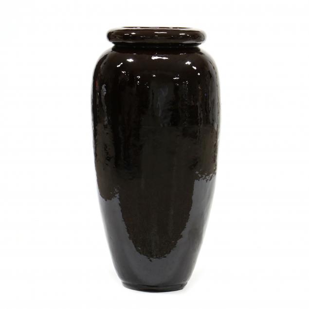 Appraisal: LARGE CONTEMPORARY POTTERY FLOOR VASE Ceramic with deep reddish umber