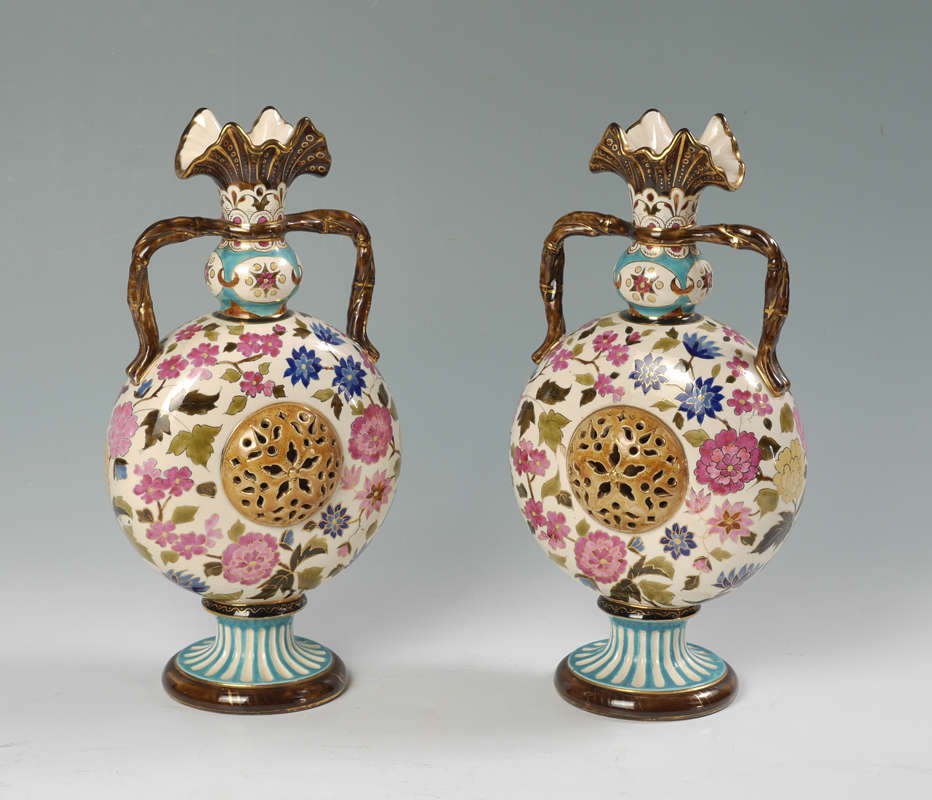 Appraisal: PAIR LATE TH CENTURY ZSOLNAY HANDLED VASES Each with ruffled