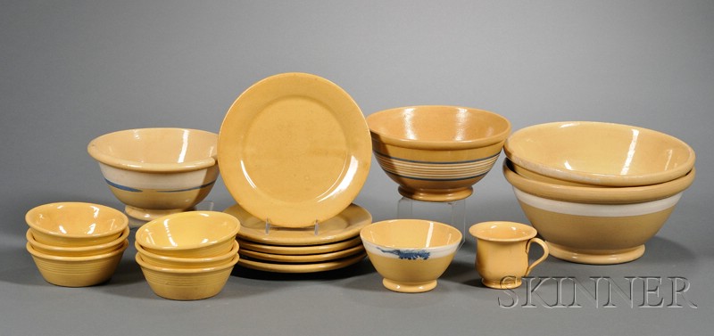 Appraisal: Seventeen Yellowware Pottery Items America late th century four mixing