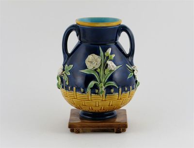 Appraisal: A Minton Majolica two-handled vase applied with cowslips and other