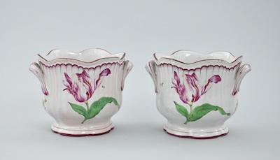 Appraisal: A Pair of French Faience Cachepots Each shaped cachepot has