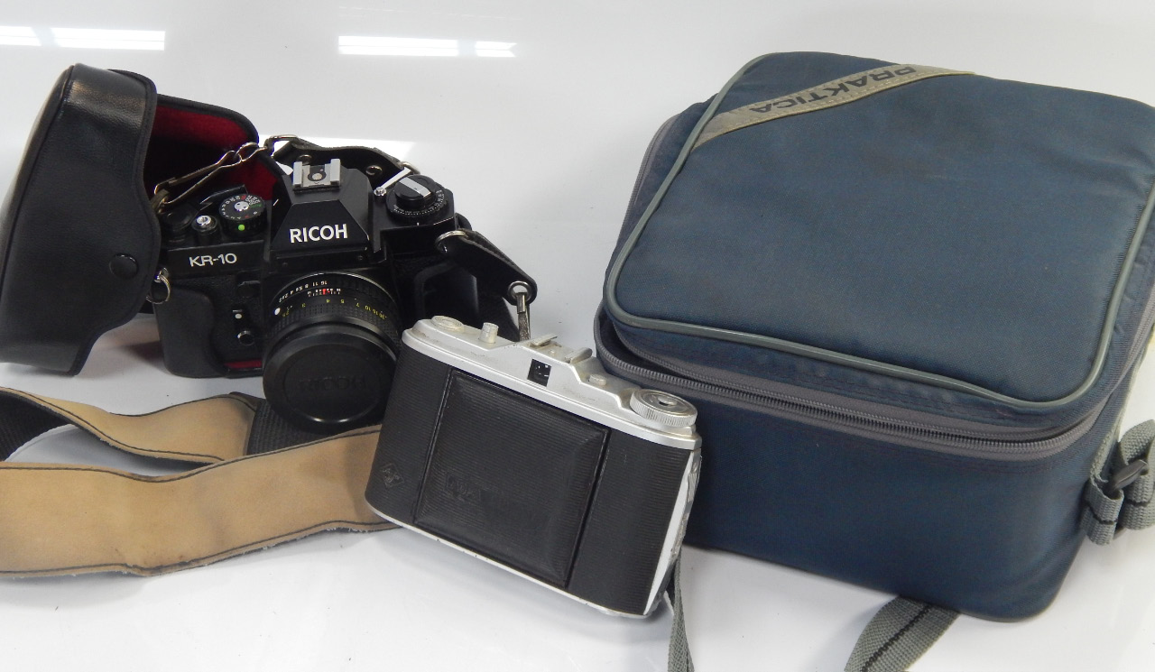 Appraisal: Photography a collection of cameras comprising Ricoh Praktica with Sigma