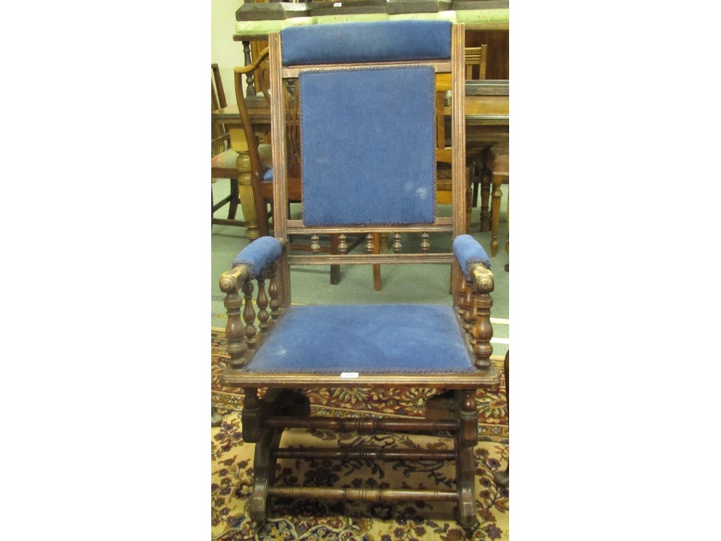 Appraisal: American mahogany spring rocking armchair