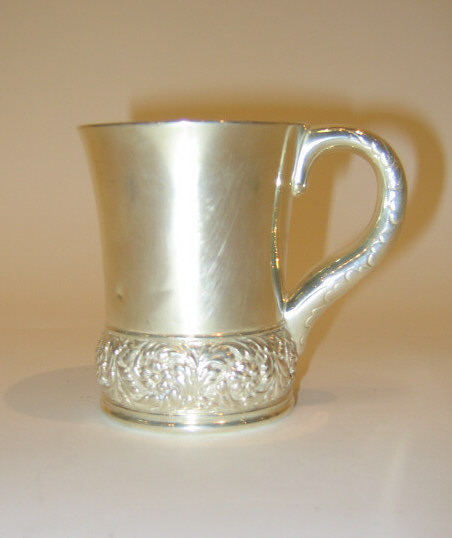 Appraisal: TIFFANY CO NEW YORK Sterling silver handled cup floral relief