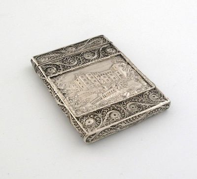 Appraisal: A Victorian double sided 'castletop' card case with a filigree