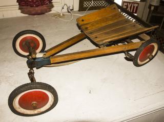 Appraisal: Steiff Child s Coaster Long Wood with Metal and Rubber