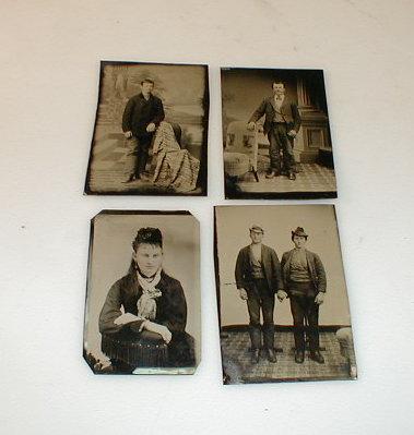 Appraisal: An album of early photographic plates and postcards