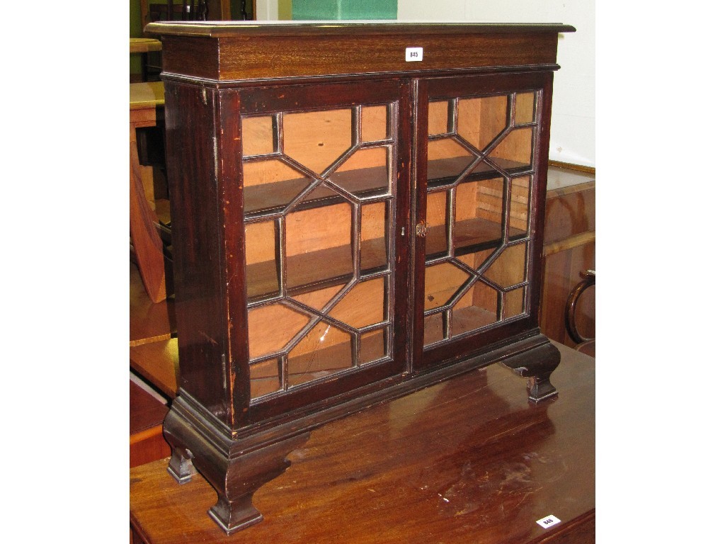 Appraisal: Small astragal glazed two door bookcase