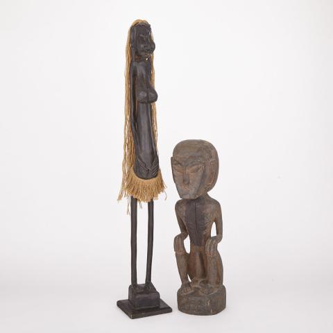 Appraisal: Carved Wood Male Fetish Figure together with a Carved Wood