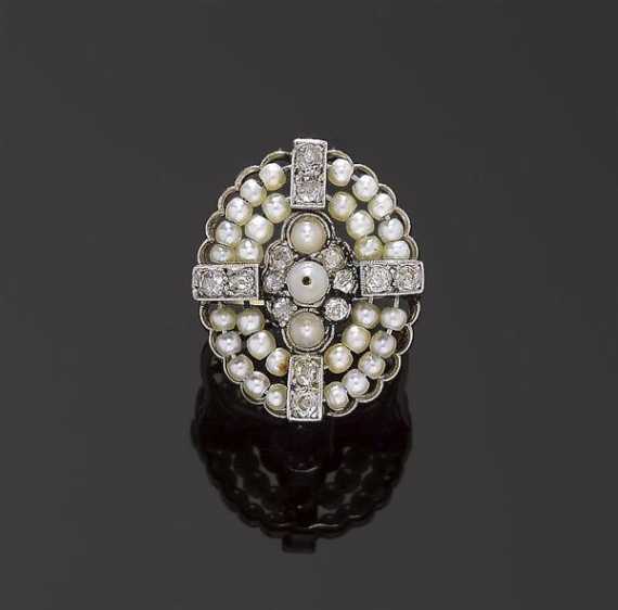 Appraisal: PEARL AND DIAMOND RING ca Platinum over yellow gold Decorative