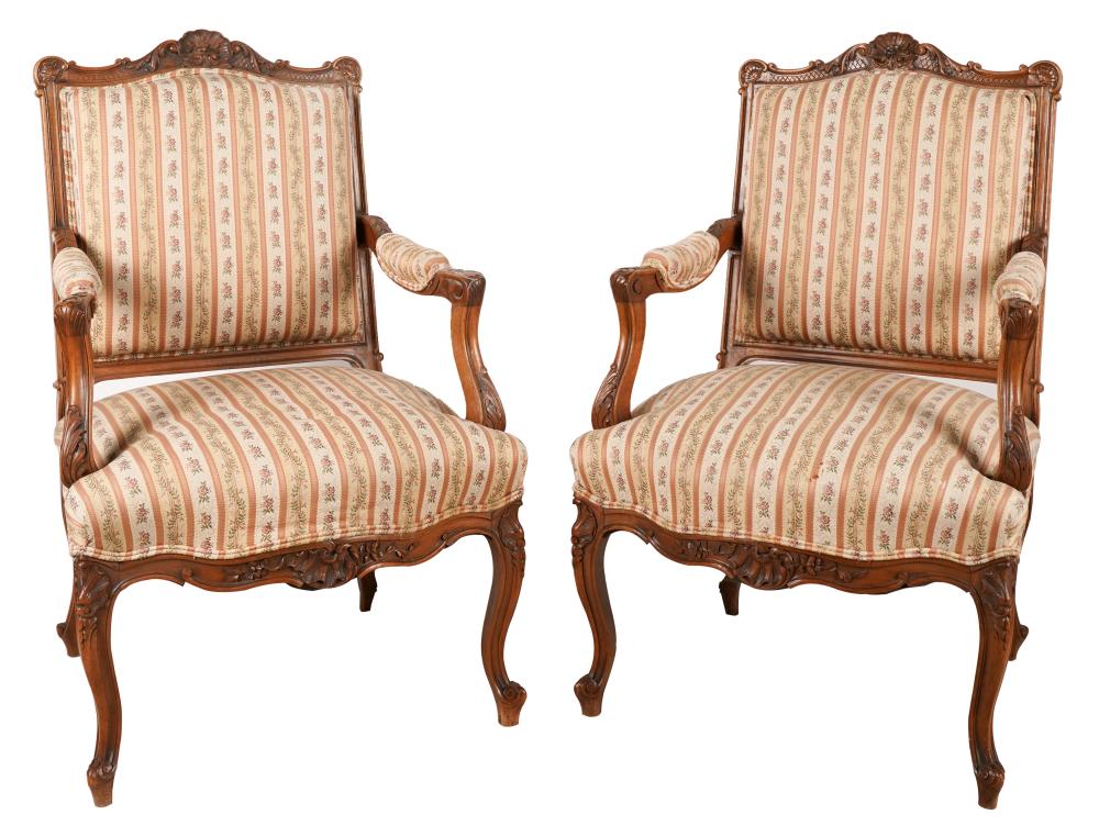 Appraisal: PAIR OF FRENCH PROVINCIAL CARVED WALNUT ARMCHAIRSProvenance The Estate of