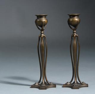 Appraisal: Pair of Tiffany Studios bronze candlesticks with paw feet Pair