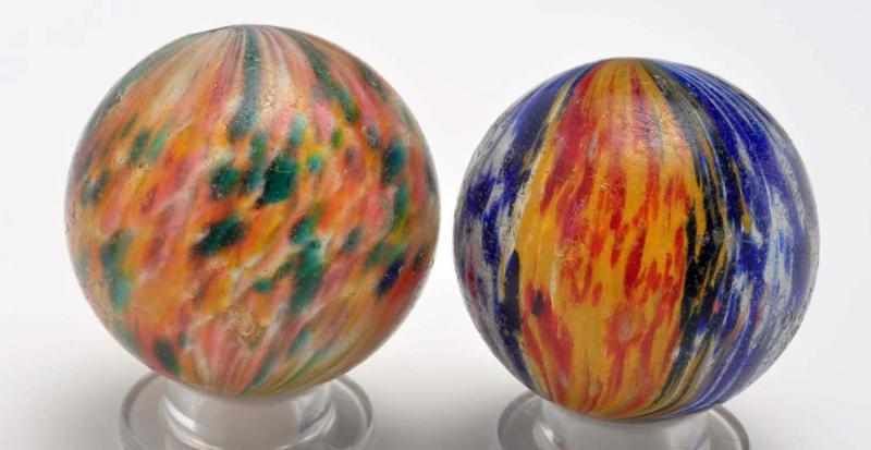 Appraisal: Lot of Large Onionskin Marbles Description The smaller marble is