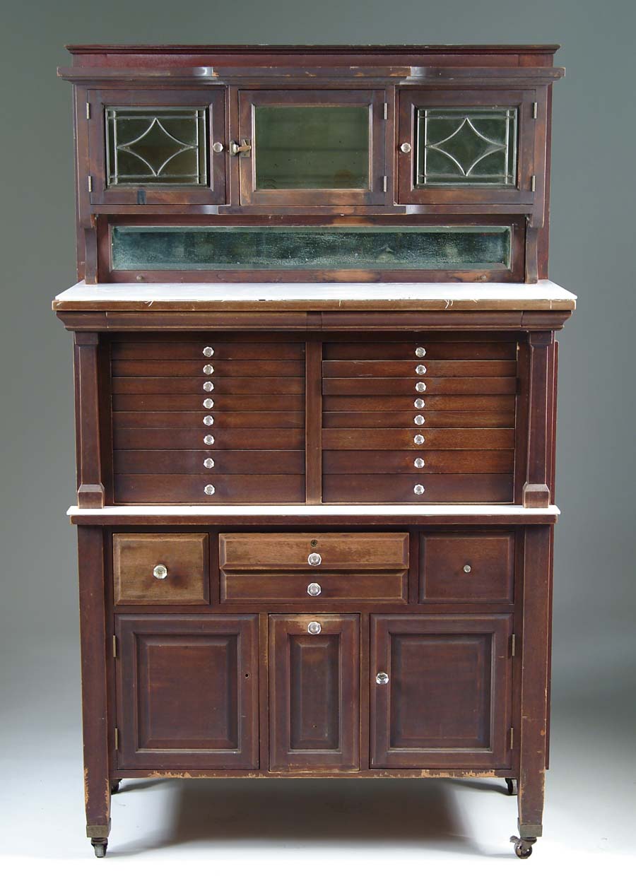 Appraisal: DENTAL CABINET Extra fancy dentist cabinet features twenty drawers with