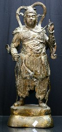 Appraisal: A Chinese brass figure of a warrior cm high